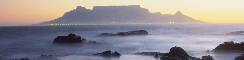 Sunset view of Table Mountain and the sea in Cape Town